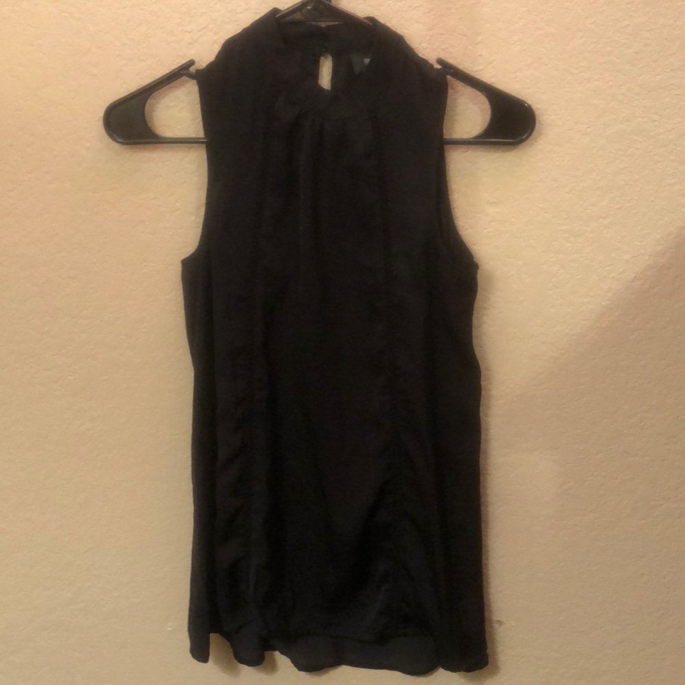 Black sleeveless blouse